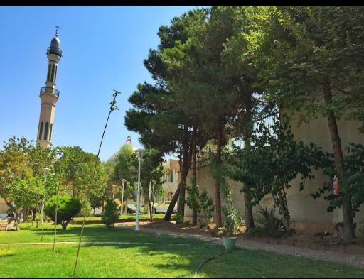 عکس فضای سبز با وسایل بازی کودک