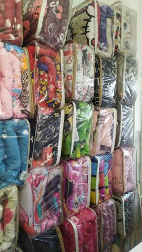 عکس پارچه سرای و کالای خواب اکسون