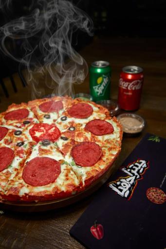 عکس پیتزا دلفیا شعبه سیدرضی 