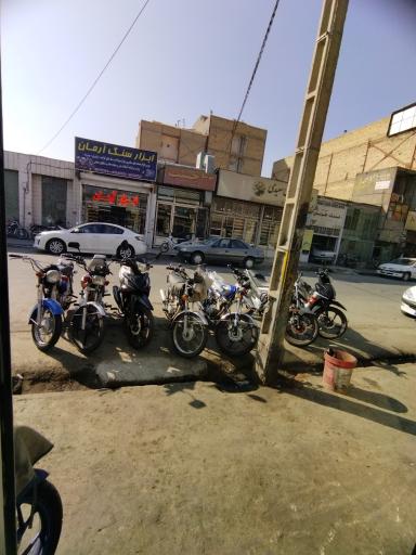 عکس تعمیرگاه موتور سیکلت علی