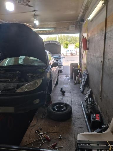 عکس تعمیرگاه هومن حجتی