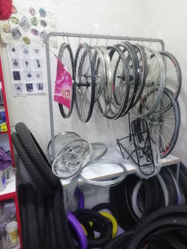 عکس فروش و تعمیر لوازم دوچرخه مسلم