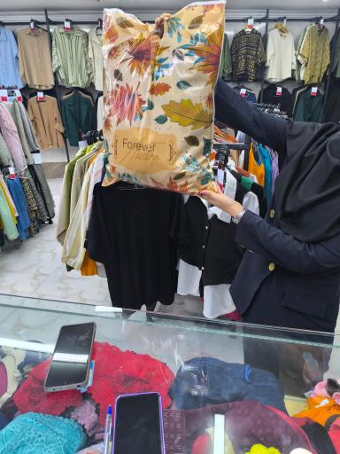 عکس پوشاک مارک لند