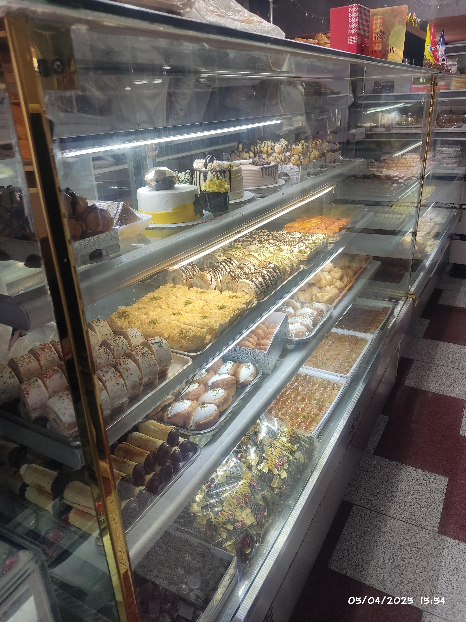 عکس شیرینی فروشی زاهدی