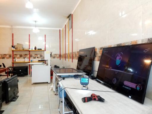 عکس تعمیرات تلویزیون پرتو تی وی