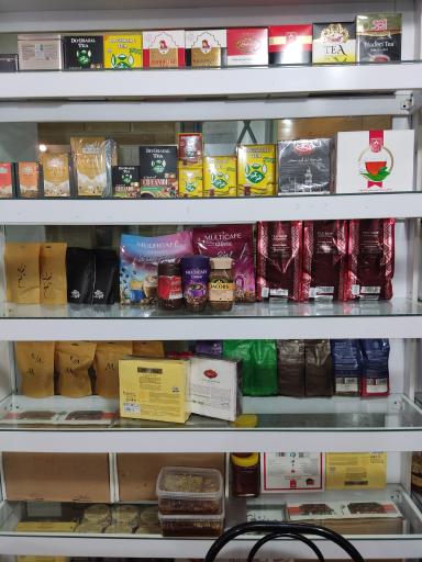 عکس فروشگاه قهوه، عسل و خرما