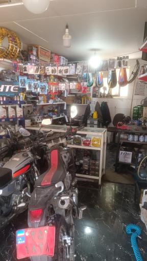 عکس تعمیرگاه ولوازم یدکی موتورسیکلت جاویدان