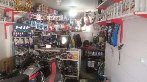 عکس تعمیرگاه ولوازم یدکی موتورسیکلت جاویدان