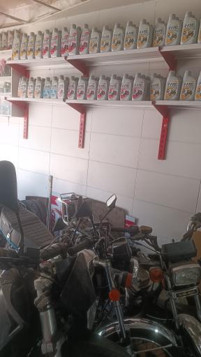 عکس تعمیرگاه ولوازم یدکی موتورسیکلت جاویدان