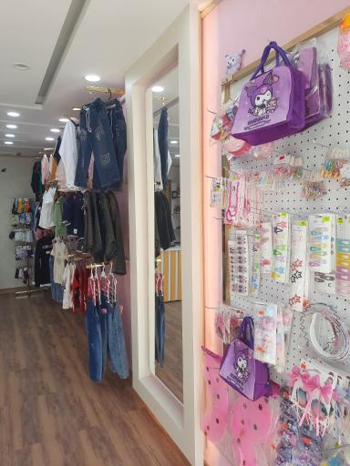 عکس پوشاک بچگانه گل کیدز