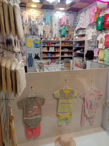 عکس پوشاک کودک تاتی