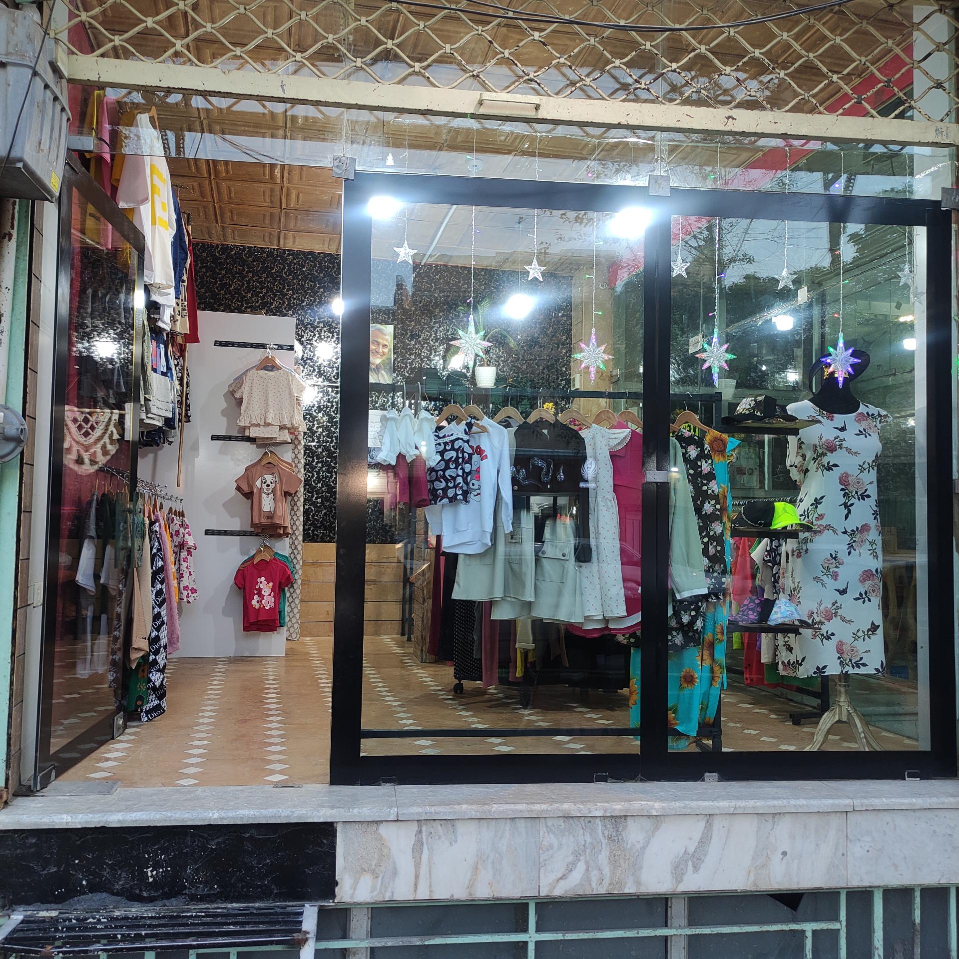 عکس ارزانسرای پوشاک ملکه