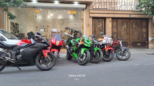 عکس تعمیرگاه و فروشگاه لوازم یدکی موتور سنگین 