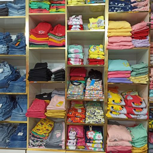 عکس پوشاک کودک دلبند