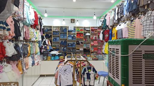 عکس پوشاک کودک دلبند