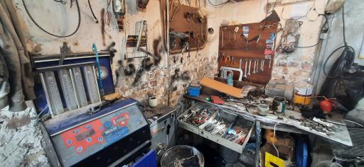 عکس تعمیرگاه خودرو اطمینان