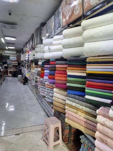 عکس فروشگاه پارچه و فرش و کالای خواب بله برون