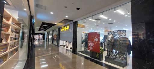 عکس فروشگاه لباس نیونل