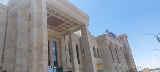 عکس فروشگاه لباس نیونل