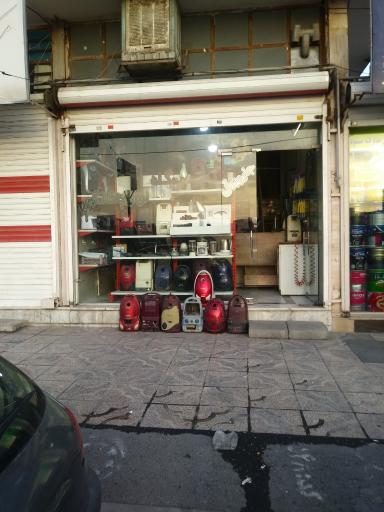 عکس تعمیرات جارو برقی سلگی