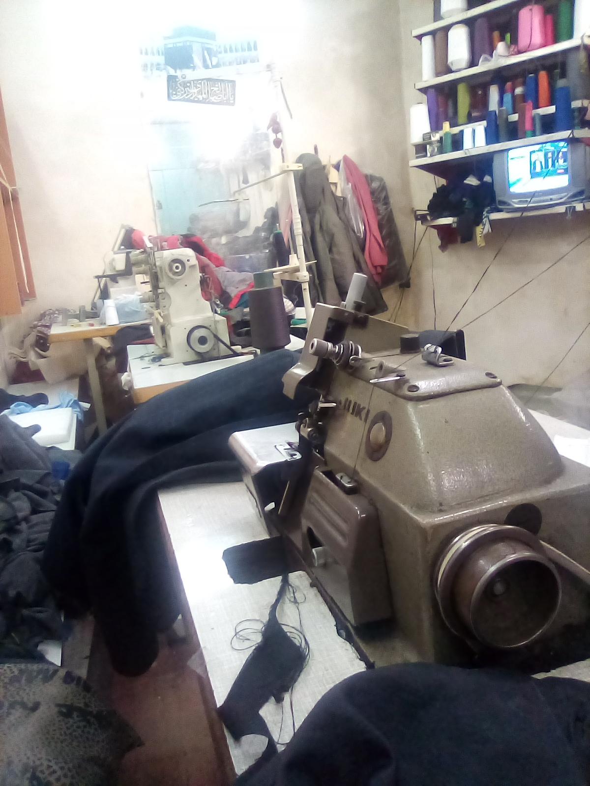 عکس تولید و پخش پوشاک عجم 