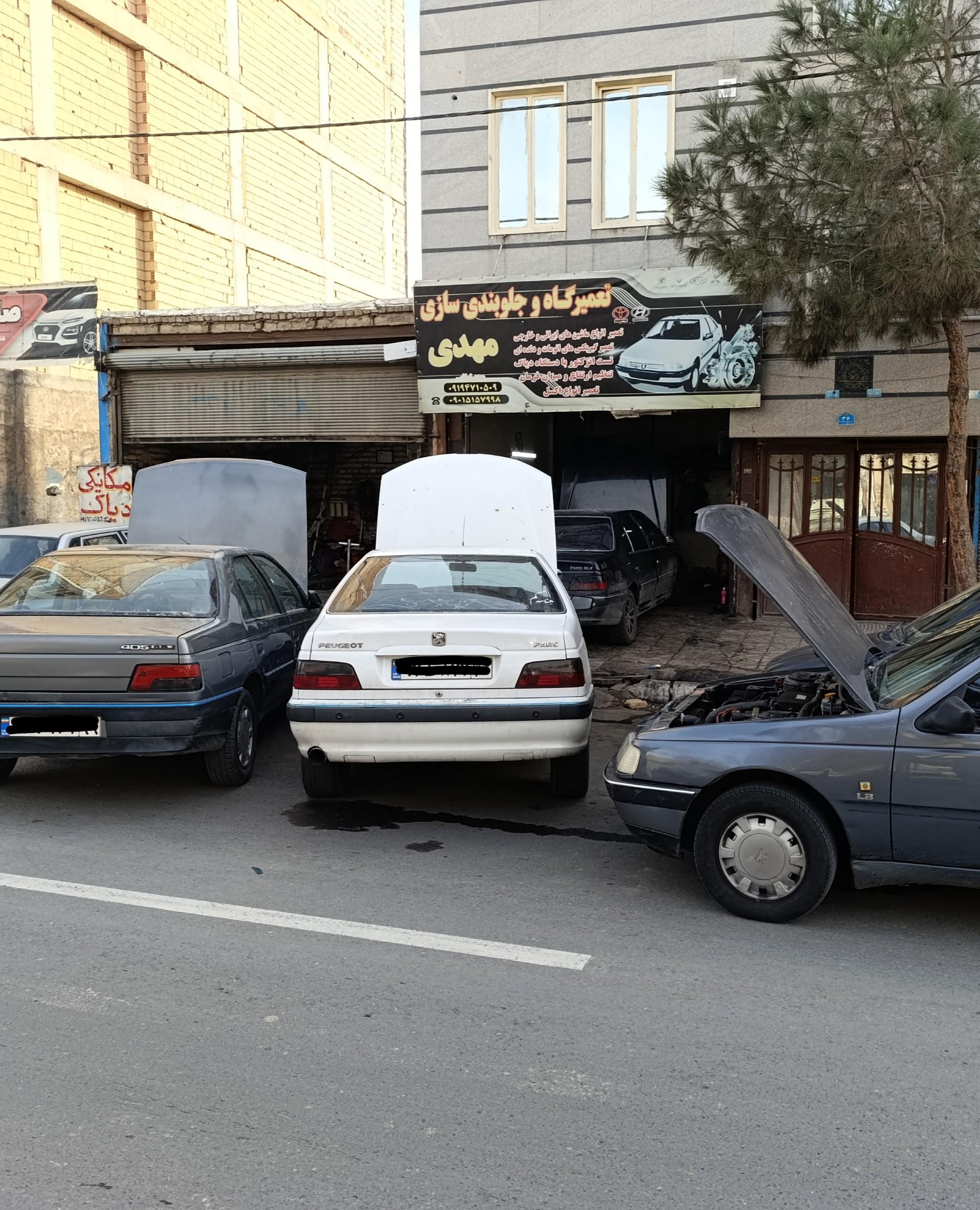 عکس تعمیرگاه و جلوبندی سازی مهدی