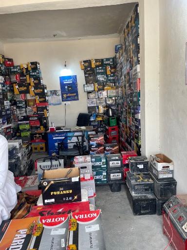 عکس باطری فروشی هوت