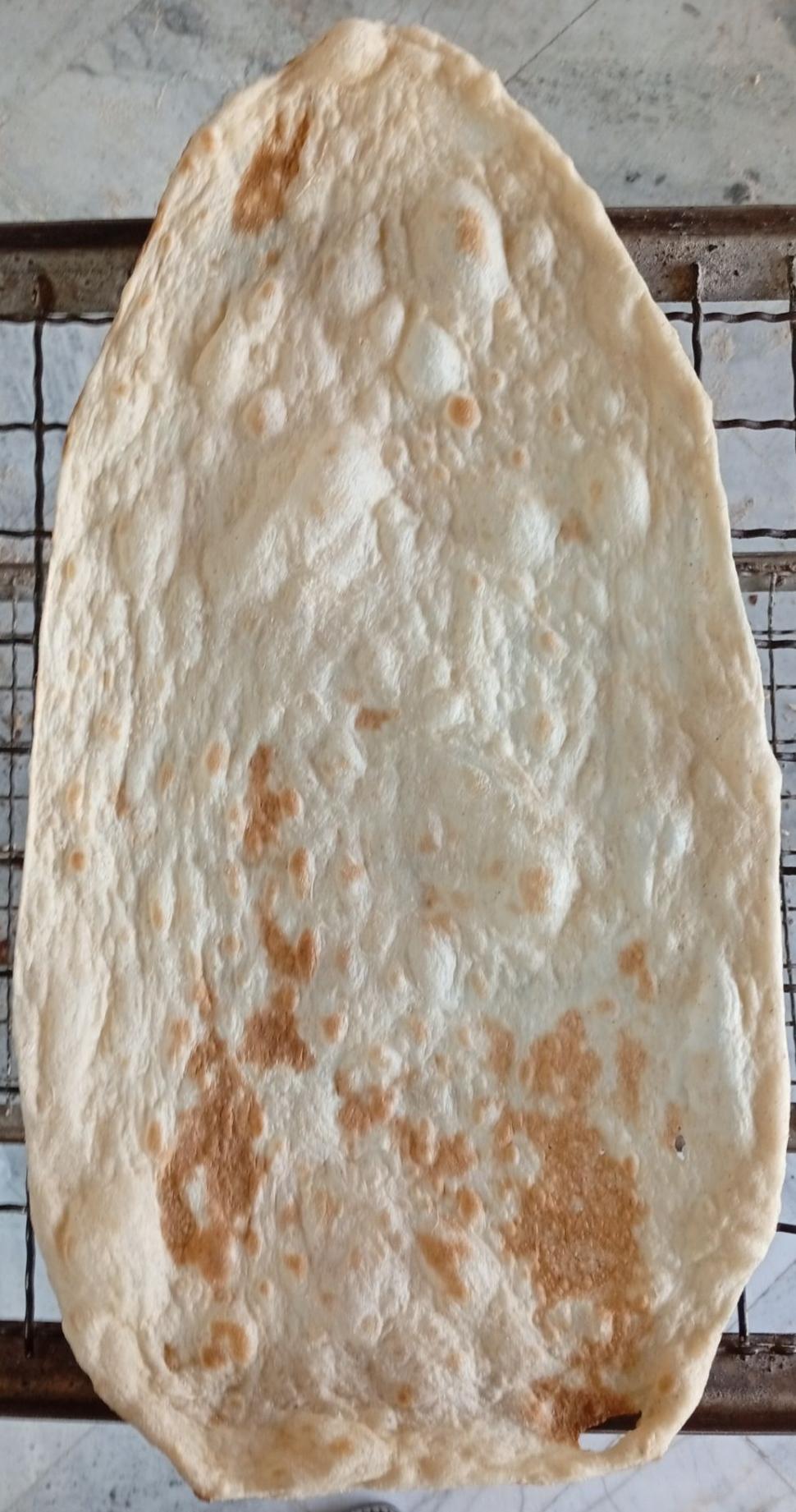 عکس نانوایی  نان تنوری