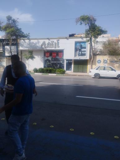 عکس فروشگاه کت و شلوار آرتمن