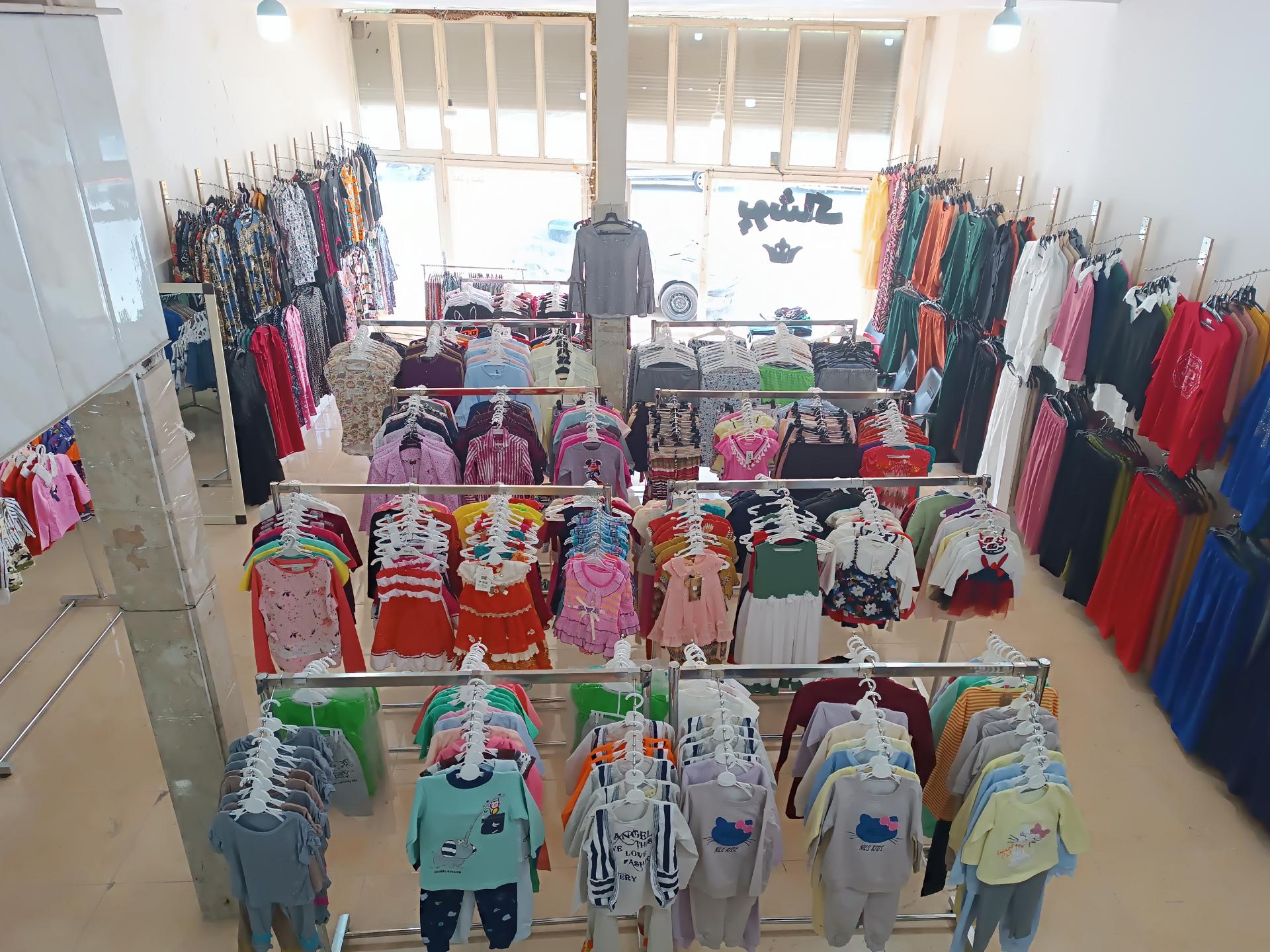 عکس ارزانسرای پوشاک تاج