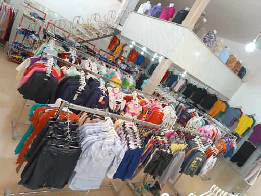 عکس ارزانسرای پوشاک تاج