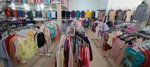 عکس ارزانسرای پوشاک تاج