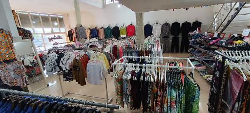 عکس ارزانسرای پوشاک تاج