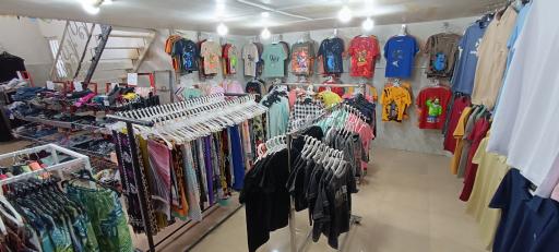 عکس ارزانسرای پوشاک تاج