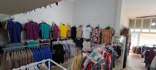 عکس ارزانسرای پوشاک تاج