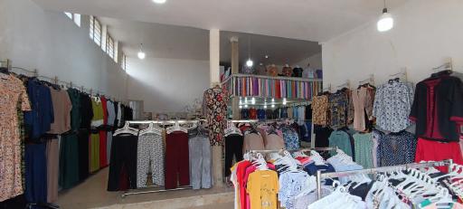 عکس ارزانسرای پوشاک تاج