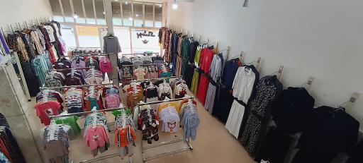 عکس ارزانسرای پوشاک تاج