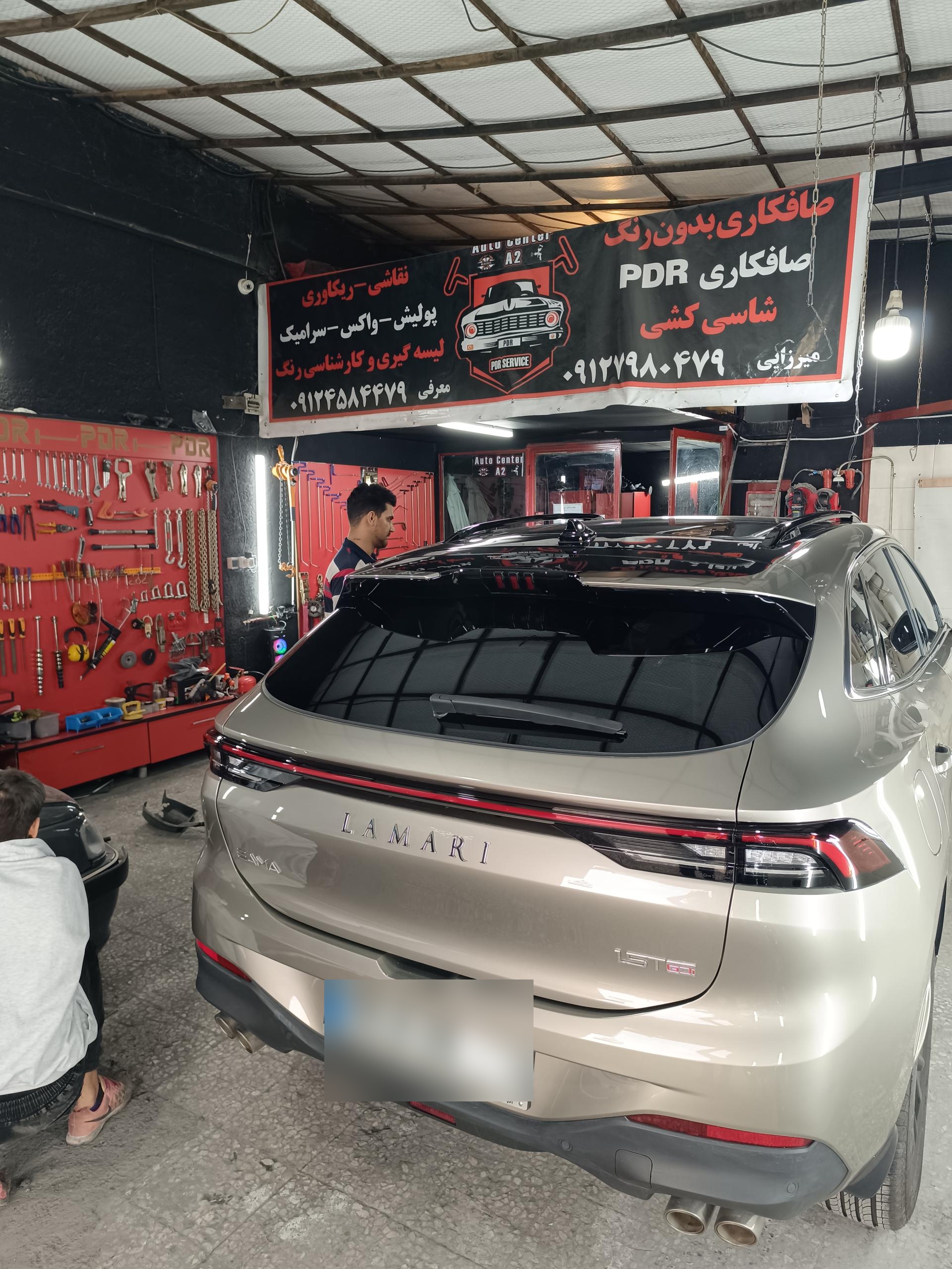 عکس خدمات خودرو میرزایی