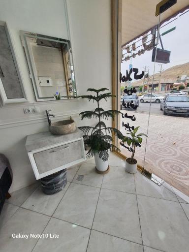 عکس دپارتمان املاک رابینسون