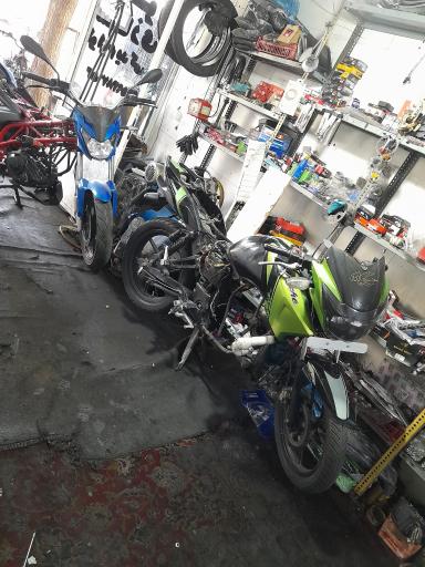 عکس تعمیرگاه فوق تخصصی موتورسیکلت های  انژکتور و کاربراتور 