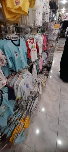 عکس فروشگاه دنیای کودک