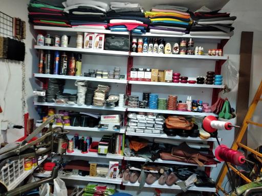 عکس مرکز تخصصی تعمیرات کیف و کفش اورجینال