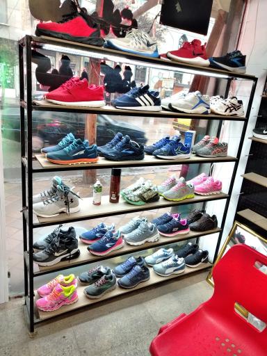 عکس مرکز تخصصی تعمیرات کیف و کفش اورجینال