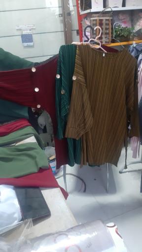 عکس تولید و پخش پوشاک شهسواری