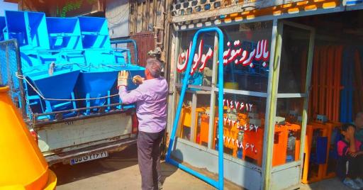 عکس بالابر و بتونیر ساختمانی مولویان