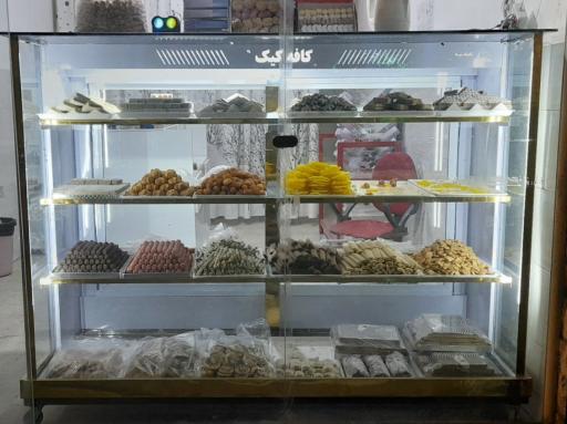 عکس شیرینی فروشی راز