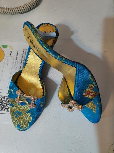 عکس فروشگاه کیف و کفش آی تک