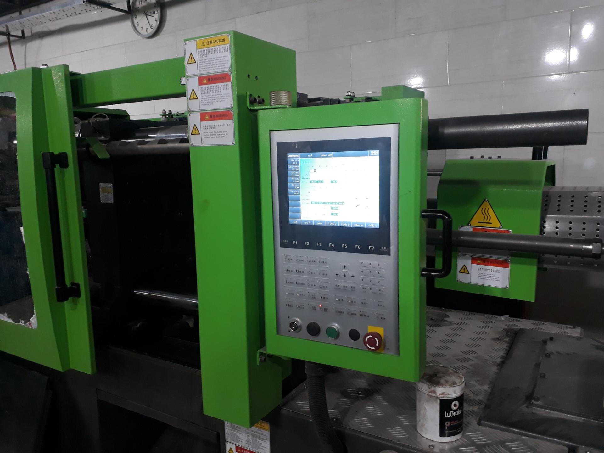 عکس تعمیرات دستگاه تزریق پلاستیک