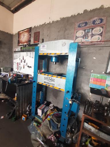 عکس تعمیرگاه جلوبندی ، تراشکاری زارعی