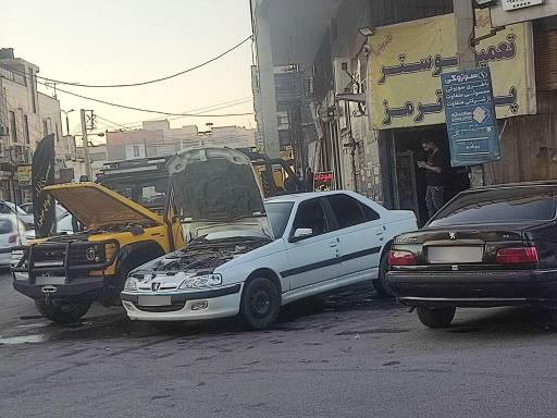 عکس تعمیر سیستم ترمز برادران بوستر و پمپ ترمز